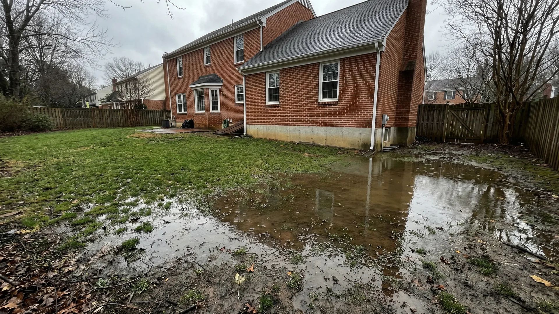 Standing water and drainage problems in Northern Virginia backyard